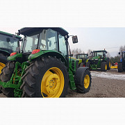 Трактор John Deere 6115 D, Київська область. Украина