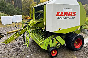 Рулонний прес-підбирач Claas Rollant 240, Волинська область. Україна